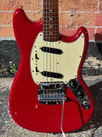 1965 Fender Mustang an all original in Dakota Red from its original owner.