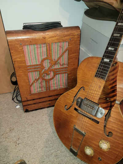 1954? Epiphone Hollow body guitar amp and original case.