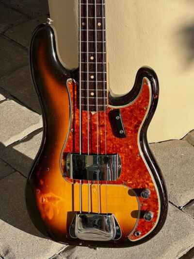 1961 Fender Precision Bass a lovely original example w / a slab rosewood neck.