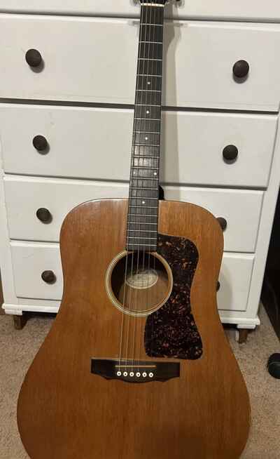 1982 model Guild Acoustic guitar. Great sound!!  Good shape!!