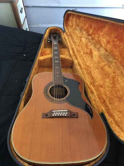 1965 Vox Folk Twelve guitar ??in very good condition, with banged-up case