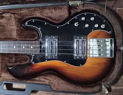 1982-vintage Peavey T-40 4 String Bass Guitar. Tobacco Burst with Rosewood!