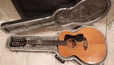 1973 Guild F-212XL Jumbo 12-string guitar with hardshell case.