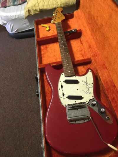 1965 Fender Mustang. signed by Eric Johnson