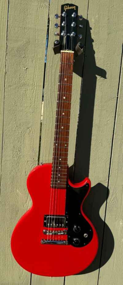 1989 Gibson Melody Maker Ferarri Red near mint condition with chainsaw case