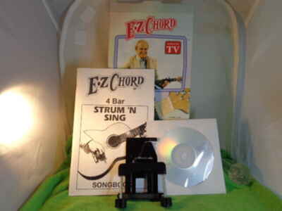 E Z Chord Fits Any Guitar Complete with CD and  Songbook