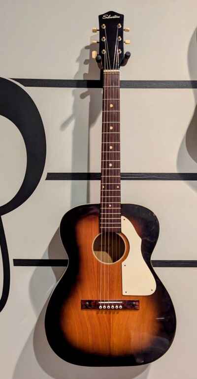 1965 Silvertone Arched back acoustic guitar model 698 sunburst