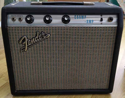 1970 Fender Champ Amplifier (Very Good Condition) with Roqsolid Cover.