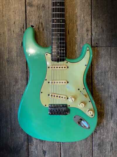 1964 Fender Stratocaster with R sewood fingerboard in Nitro Green refinish