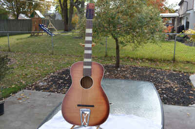 Airline brand acoustic flat-top guitar made by Harmony in the 1960